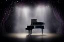 Discovery splash banner for Starving Pianists Discord server